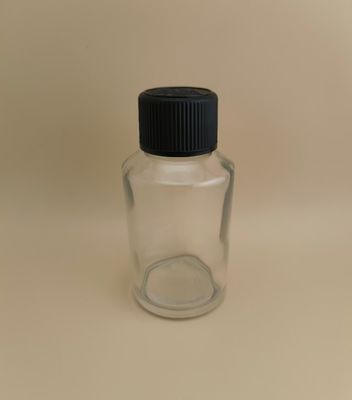 ขวดแก้วกลมใสดีไซน์ละเอียดอ่อน พร้อมฝาปิดพิเศษสำหรับยา