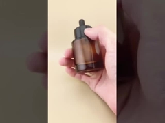 ขวดดรอปเปอร์ทรงกลมเรียบสีน้ำตาลใส ดีไซน์ละเอียดอ่อน สำหรับเอสเซ้นส์