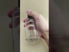 ขวดแก้วกลมใสดีไซน์ละเอียดอ่อน ขนาดใหญ่ ผิวเรียบเนียน พร้อมฝาปิดพิเศษสำหรับยา